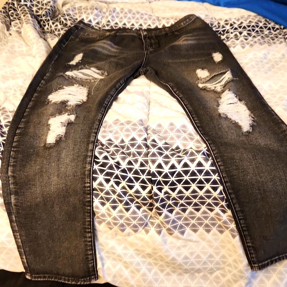 Faded black ripped jeans
